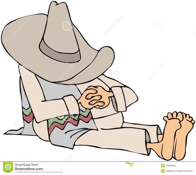 man-wearing-sombrero-taking-siesta-19939348